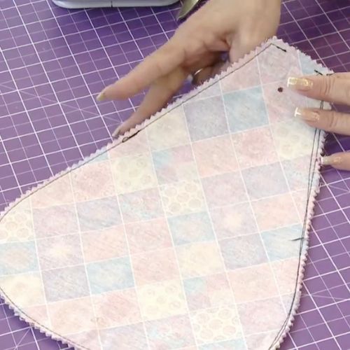 Mochila versátil com náilon amassado ()
